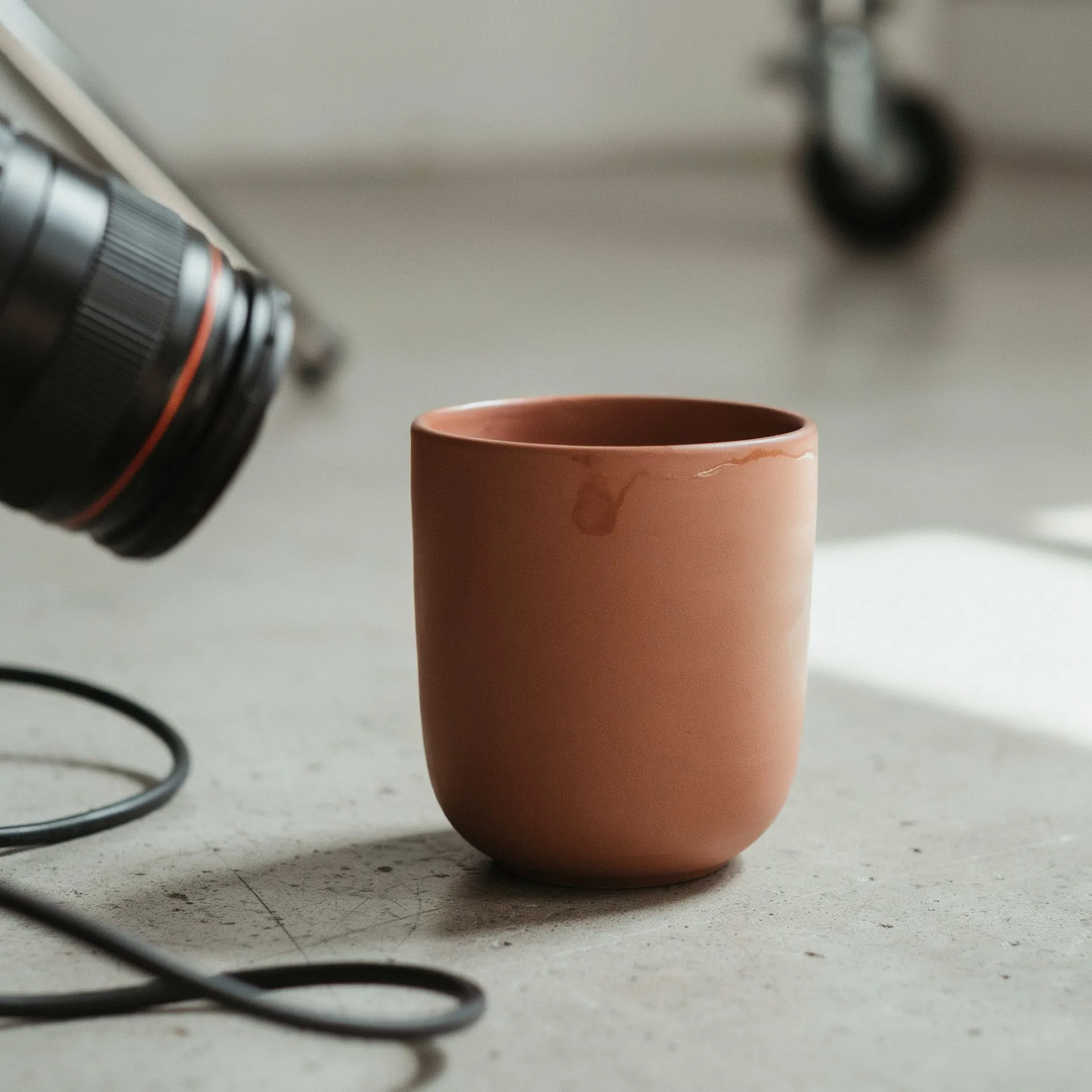 A product positioned under studio lighting on a shoot surface at Webcomp Digitex's Pimpri-Chinchwad studio